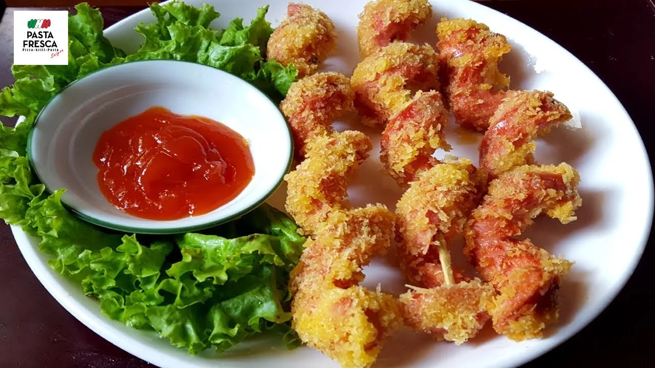 Salsiccia fritta - uno dei popolari stuzzichini per la colazione