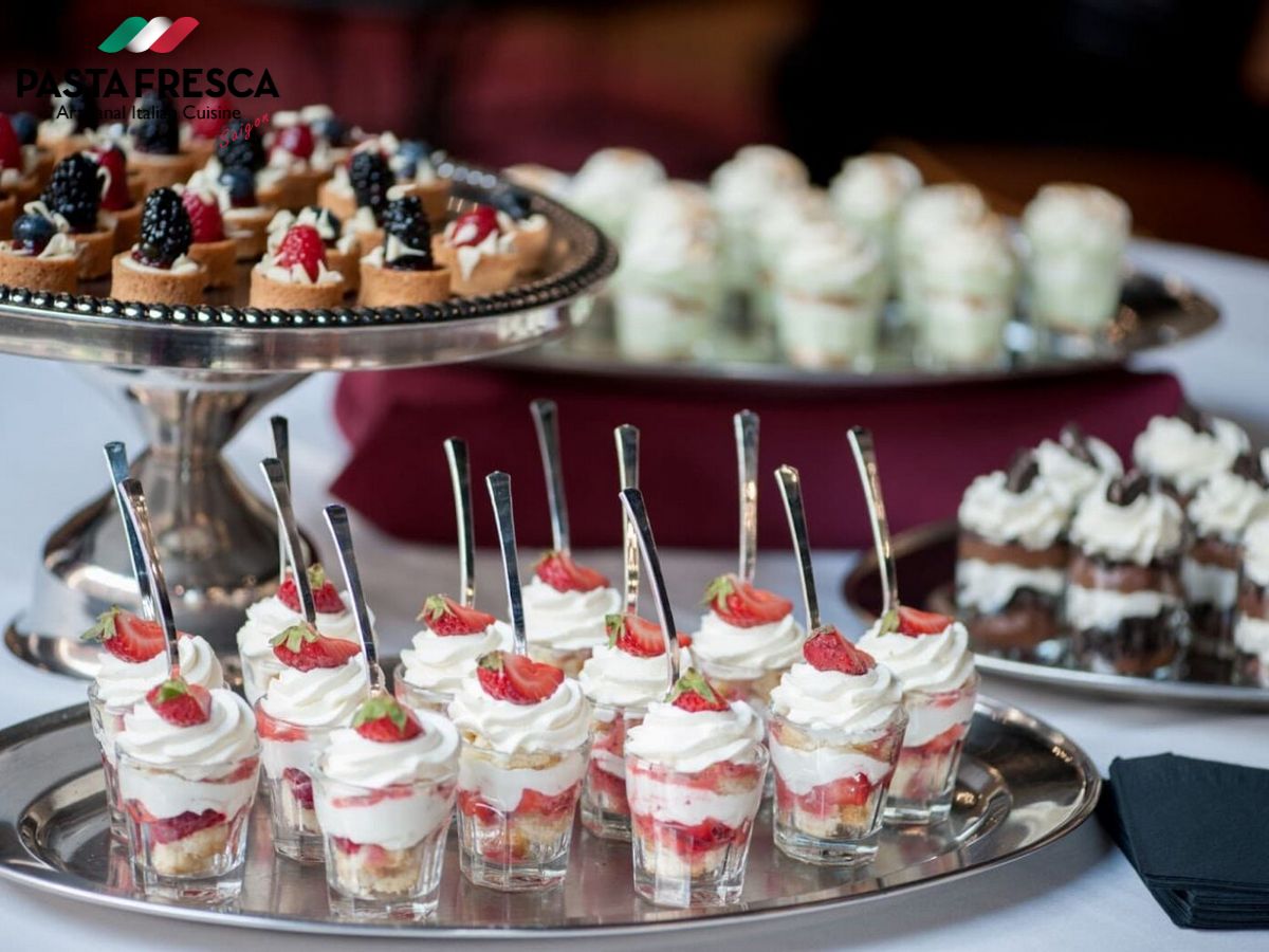 A classic way to finish your buffet party catering or business lunch is by serving perfectly sliced pieces of cake topped with fruits and cherries